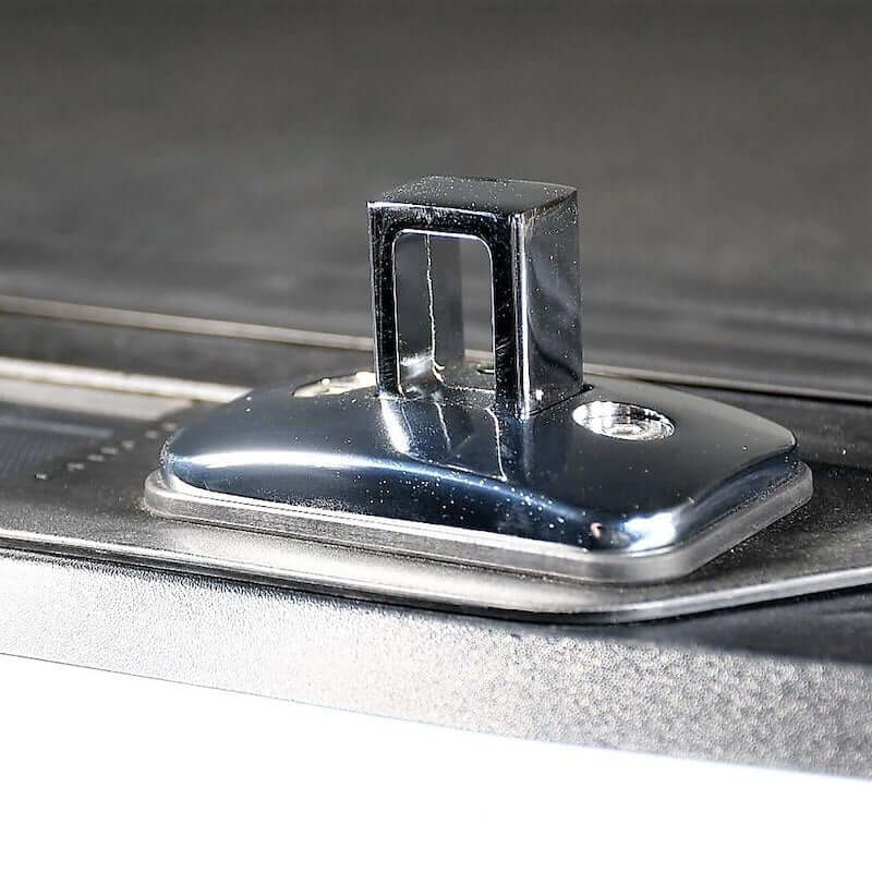 Putco chrome stake pocket tie down anchor for pickup trucks, durable and stylish cargo solution.