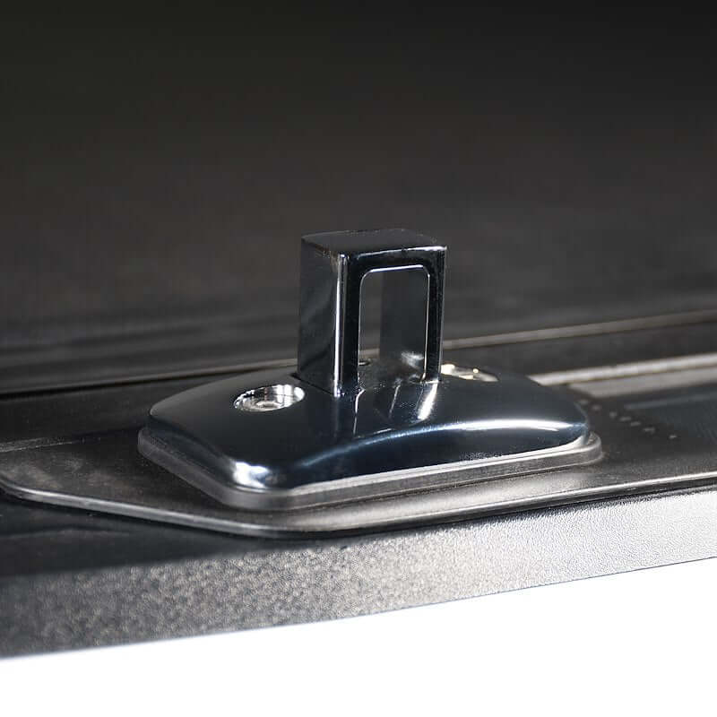 Close-up of Putco Chrome Stake Pocket Tie Down Anchor for pickup trucks, showcasing durable construction.