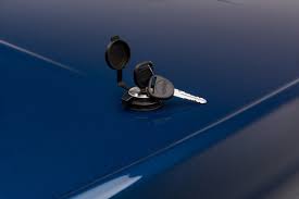 UNDERCOVER Elite LX Painted Hard Tilt-Up Tonneau Cover 5'7" Fits 2015-20 F150 - Magnetic Effect