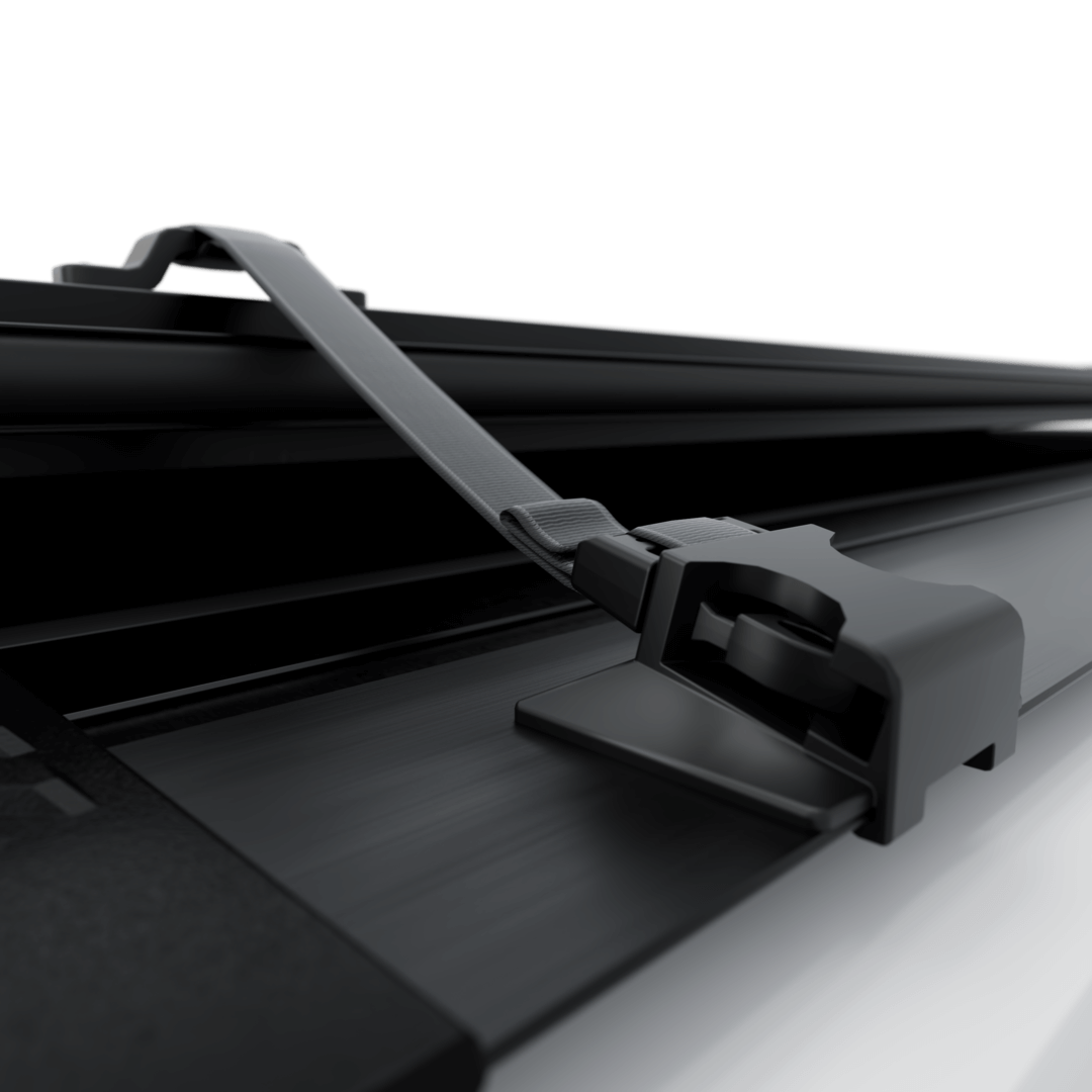 hard aluminum tonneau cover for Chevrolet Colorado with a secure fastening mechanism.