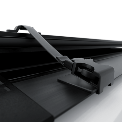 hard aluminum tonneau cover for Chevrolet Colorado with a secure fastening mechanism.
