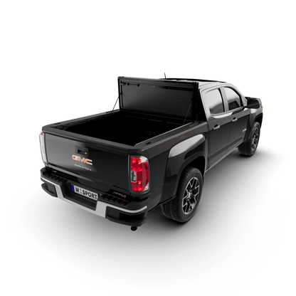 hard aluminum tonneau cover for Chevrolet Colorado on a black GMC truck