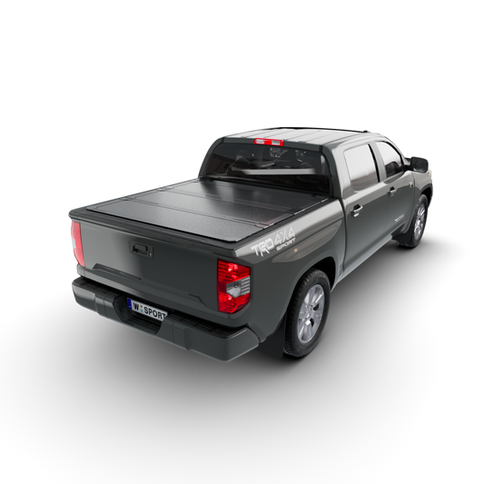 hard aluminum tonneau cover for Toyota Tundra installed on a 2022 Toyota Tundra truck.
