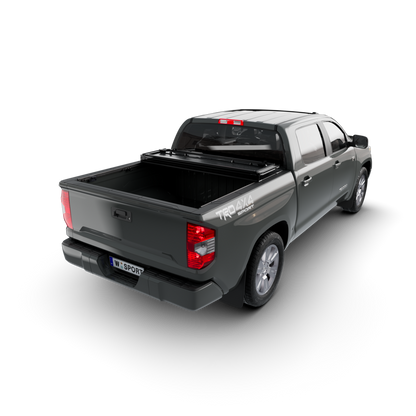 hard aluminum tonneau cover for Toyota Tundra installed on a grey truck with open bed view