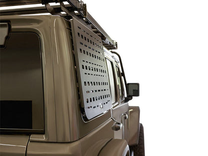 Jeep Wrangler JLU rear window Molle panel mounted on a 4-door Jeep, showcasing innovative storage solution.