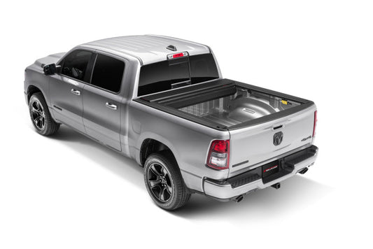 ROLL-N-LOCK E-Series Hard Power Retractable Tonneau Cover 67.4 In. Fits 2019-24 Ram 1500 No RamBox