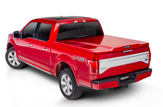 UNDERCOVER Elite LX Painted Hard Tilt-Up Tonneau Cover 5'7" Fits 2019-25 Ram - Velvet Red Pearl