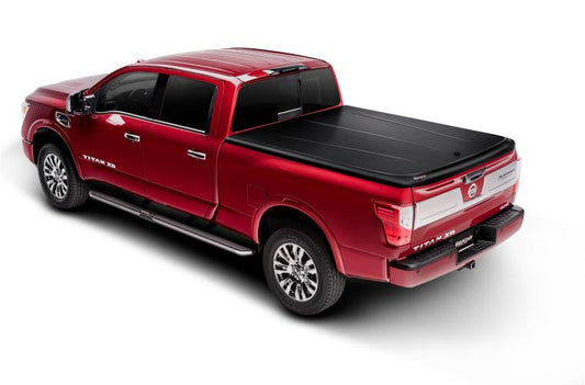 UNDERCOVER SE Hard Tilt-Up Tonneau Cover 5'7" Fits 2016-23 Nissan Titan - Black Textured