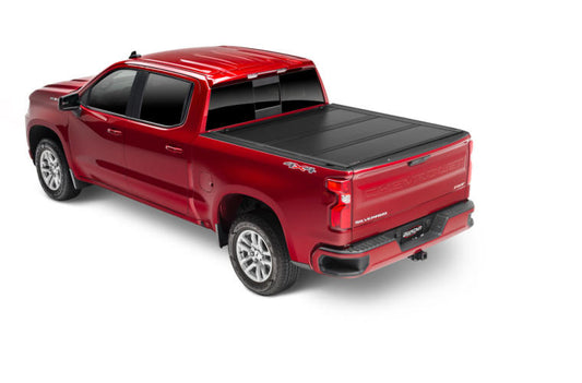 UnderCover Ultra Flex Hard Folding Tonneau Cover 5'6" Fits 2007-21 Tundra w/ Deck Rail System - Black Matte